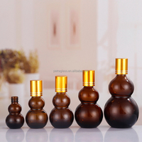 Bouteille à rouleaux en verre en forme de gourde unique pour huile essentielle de parfum 10ml 20ml 30ml 50ml 100ml emballage vide de cosmétiques en rouleau ambré
