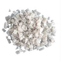 Flocons de chlorure de magnésium à 99 % de pureté, essentiels pour le contrôle de la poussière et la stabilisation des routes non pavées et la solidification du sol