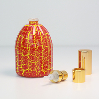 Décoration personnalisée Produits les plus vendus Vaporisateur de fissures jaune-orange Tête de pulvérisation de parfum en aluminium Flacon en verre de parfum de 50ml