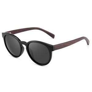 Lunettes de soleil unisexes en bois de bambou, monture ronde noire, verres polarisés TAC UV400 pour la protection solaire, les voyages, la conduite et la mode - Product Image 1