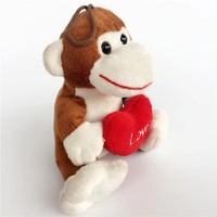 Llavero de peluche de mono marrón mini al por mayor, juguete de mono de peluche pequeño abrazando un corazón rojo, colgante para bolso