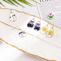 Boucles d'oreilles pendantes en résine avec fleurs séchées véritables, faites à la main, style bohème, bijoux naturels, cadeau pour femme, vente en gros