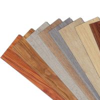 Revêtement de sol auto-adhésif SPC de qualité supérieure de 5mm Revêtement de sol en vinyle Chevron
