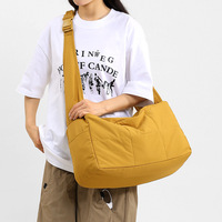 Sac bandoulière décontracté d'extérieur unisexe grande capacité léger en nylon avec fermeture éclair style urbain minimaliste en polyester