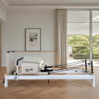 Machine d'entraînement de qualité supérieure pour studio de yoga et de Pilates, fabriquée par le fabricant OEM, de qualité commerciale, couleur beige tendance, Reformer de Pilates en aluminium