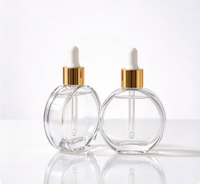 Flacon compte-gouttes rond en verre transparent vide de 20 ml pour sérum, huile capillaire ou huile essentielle, avec logo personnalisé, sérigraphié et estampé or