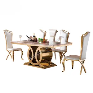 大理石餐桌黄金与不锈钢垫座