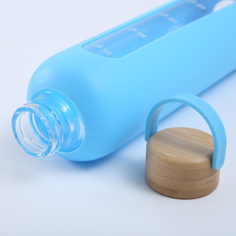 Wholesale Classic BPA free high heat resistant borosilicate glass water bottle with lid