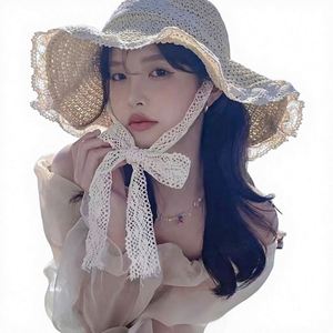 หมวกสานทรงชาวประมงสำหรับฤดูร้อน สวมใส่สบายๆ สำหรับกิจกรรมกลางแจ้ง พิมพ์ลายสกรีน  ตกแต่งโบว์ดอกไม้  รับทำแบรนด์ตามสั่ง - Product Image 1