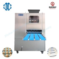Machine automatique à grande capacité en acier inoxydable pour la division et le façonnage de pâtes sans huile, pour des boules de pâte de poids précis.