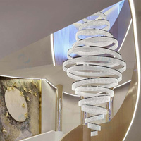 Lustre en cristal à anneaux spirales, luminaire suspendu sur mesure à plusieurs boucles pour hall d'hôtel, atrium et plafond haut