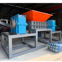Déchiqueteur automatique à deux arbres de grande capacité pour jantes de roues, moyeux, carter de moteur et pièces en aluminium moulé en vrac