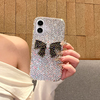 Coque de téléphone portable 15 en TPU luxueuse et élégante, antichoc, avec nœud scintillant en diamant et protection d'appareil photo – Accessoire tendance