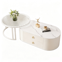 Ensemble de tables basses modernes de style crème avec plateau rond en pierre, tables gigognes de luxe, design décoratif combiné pour salon domestique