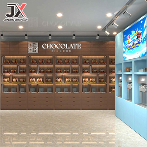 <span class=keywords><strong>Comptoir</strong></span> <span class=keywords><strong>de</strong></span> confiserie Sweetshop, présentoir à sucettes, vitrine à bonbons, étagère <span class=keywords><strong>de</strong></span> présentation pour chocolaterie, mobilier design personnalisé avec LED - Product Image 1