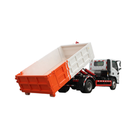 Camion benne hydraulique à bras articulé : Opération multi-conteneurs pour un transfert de déchets efficace et une logistique économique