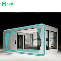 Junyaoding Design moderne 20FT & 40FT Bureau mobile en acier pour l'extérieur Petite maison Cabine préfabriquée pour villa, boutique et cabine de travail