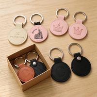 Porte-clés rond en cuir PU avec estampage à chaud doré, idéal pour les salons professionnels, cadeaux promotionnels, impression personnalisée OEM, articles de merchandising pour foires commerciales