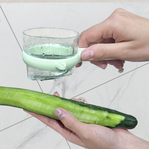 Pelador de frutas y verduras creativo con caja de almacenamiento, pelador de frutas y verduras antisalpicaduras, pelador de frutas. - Product Image 1