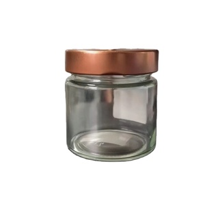 定制徽标形状212ml 180ml透明圆形短玻璃罐容器，带金属铜色，用于酱料食品 - Product Image 1