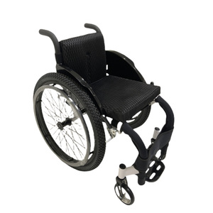 Silla de ruedas manual de aleación de aluminio negra con ruedas todoterreno, ligera y portátil para uso doméstico y de viaje. - Product Image 1