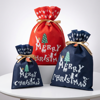 Sac à cordon portable réutilisable de designer en plastique non tissé pour cadeaux de Noël