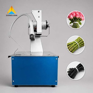 Macchina automatica per l'imballaggio con corda elastica per prodotti al dettaglio, con effetto nodo uniforme e aspetto ordinato - Product Image 1