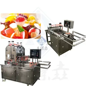 उच्च गुणवत्ता वाली स्वचालित औद्योगिक उत्पादन लाइन बीन डिपॉजिटर जेली कैंडी मेक बियर गमी मशीन कैंडी
