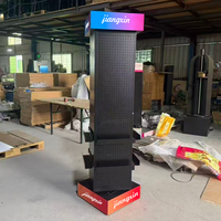 Présentoir de sol métallique à 4 faces avec panneau perforé et étagères rotatives pour magasin de détail, vente en gros