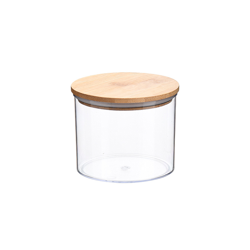 Cuerpo de caja transparente con tapa de bambú.