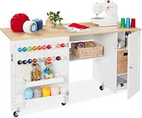 Grande table de couture pliable, station de travail compacte et polyvalente avec roulettes, deux plateaux et portes magnétiques