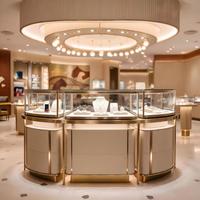 Vitrine de présentation de bijoux et de montres de luxe moderne et personnalisée avec éclairage LED et structure métallique pour les magasins de détail