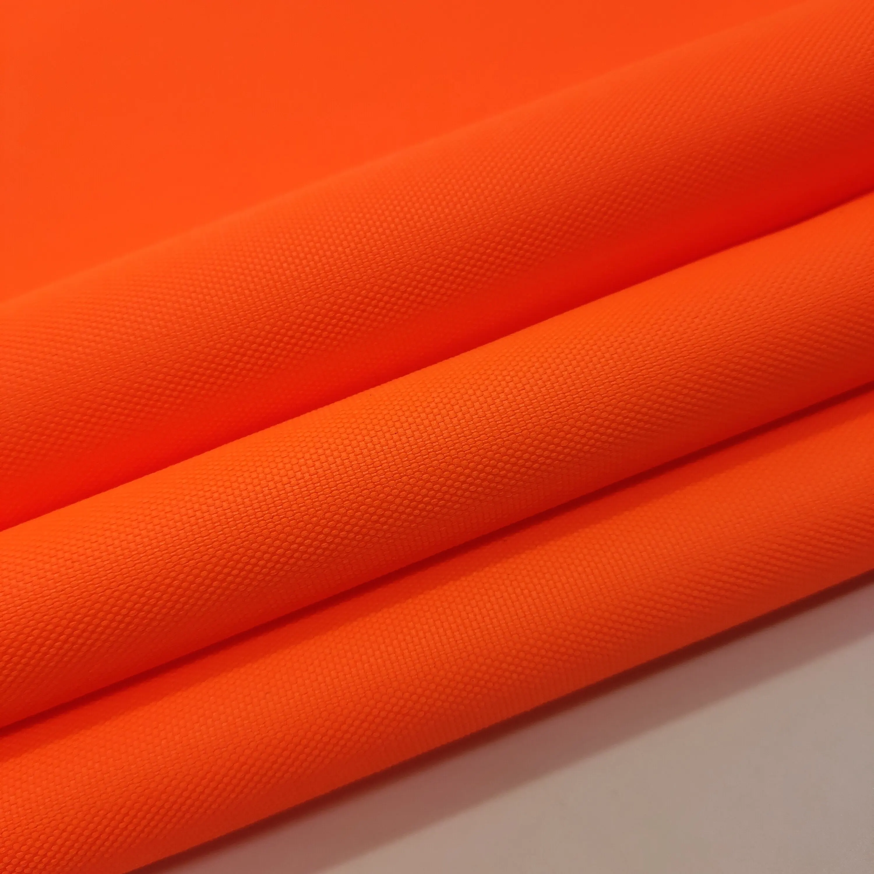 नारंगी फ्लोरोसेंट कपड़े निविड़ अंधकार 420d फ्लोरोसेंट नारंगी निविड़ अंधकार ऑक्सफोर्ड कपड़े के लिए सुरक्षा निहित