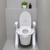 Siège de toilette électrique réglable en hauteur pour la réadaptation et la thérapie