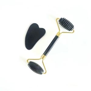 Precio al por mayor de fábrica obsidiana negra roscada fría 100% rodillo de jade real y juego de Gua Sha - Product Image 1