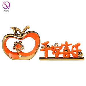 เครื่องประดับแอปเปิ้ลสีทองตกแต่งบ้านสร้างสรรค์หรูหรา <span class=keywords><strong>Apple</strong></span> หัตถกรรมสําหรับโต๊ะรับประทานอาหารตู้ไวน์ตกแต่งคริสต์มาส