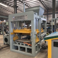 Machine automatique de fabrication de briques en béton QT4-15 pour blocs creux, pavés de jardin et production de briques murales durables