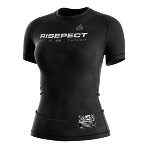 Camiseta de Compresión para Mujer con Protección UPF50+, Tejido Elástico en 4 Direcciones y de Secado Rápido, Ideal para Actividades Acuáticas y de Artes Marciales - Product Image 1