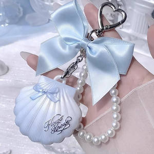 Flower Knows Shell's Jewel Bag Colgante de Concha con Lazo, Crema Iluminadora, Piedra Lunar, Lágrimas Azules, Tridimensional, Nacarado - Product Image 3