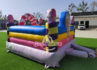Structure gonflable personnalisée en forme de bonbon pour enfants, idéale pour les événements extérieurs, les parcs d'attractions et les locations commerciales.