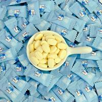 Bonbons pressés saveur lait australien, emballés individuellement, collation portable pour le bureau, vente chaude du fabricant chinois