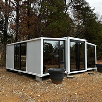 OEM préfabriqué 20 pieds 30 pieds 40 pieds Mini cabine en bois pliante à double aile Maison 2 chambres Façade en verre Maison conteneur extensible
