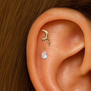 Boucle d'oreille à dos plat en or 18 carats et argent sterling S925, motif lune, étoile, pompon, œil et cristal bleu, étoile à quatre branches - Product Image 4