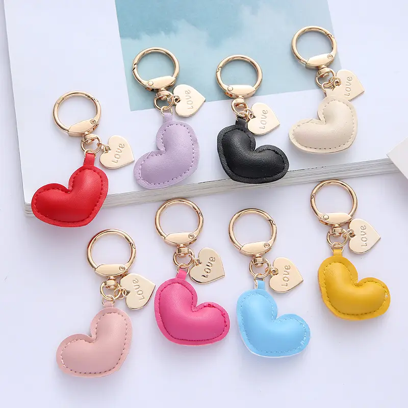 Alta calidad lindo 3D forma de corazón llaveros de cuero amor Metal colgante llavero coche monedero bolso encantos colgante pareja regalo llavero