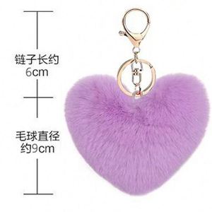 ขายดี พวงกุญแจรูปหัวใจขนปุยหลากสี ลายเสือดาว ของตกแต่งรถยนต์ ขายส่ง - Product Image 6