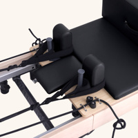 Machine de Pilates Reformer en bois avec design à rail complet et cadre réglable surélevé pour l'entraînement quotidien à domicile ou en studio