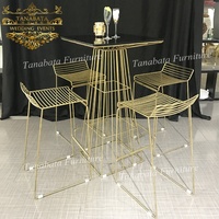 Table haute de bar en fil métallique doré pour café bistro