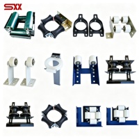 Dispositif de guidage à rouleaux pour chaîne de compensation d'ascenseur, stabilisateur anti-oscillation en caoutchouc, guide de chaîne compensatrice pour ascenseur à structure ouverte