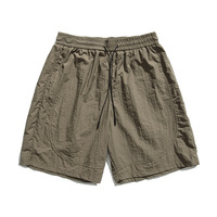 HIC hommes été 100% Nylon couleur unie lâche genou longueur large jambe Shorts décontracté sport Shorts