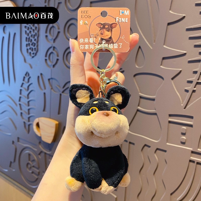 Pendentif original abeille et chien accrocheur